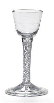 Lot 21 - A Lynn Type Cordial Glass, circa 1760, the ribbed rounded funnel bowl on a gauze twist stem and...