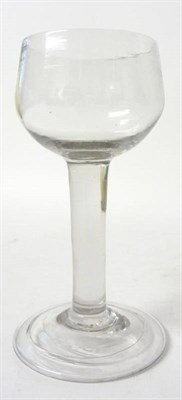 Lot 22 - A Wine or Mead Glass, circa 1740, the rounded cup bowl on plain stem and folded foot, 14.5cm high