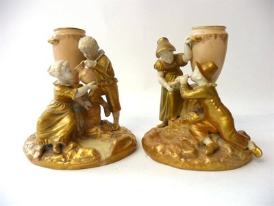 Lot 60 - A Pair of Royal Worcester Porcelain Figure Groups, 1919, each as a boy and girl in traditional...