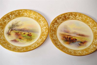Lot 62 - A Pair of Royal Worcester Porcelain Plates, 1912, painted by Harry Stinton with cattle beside a...