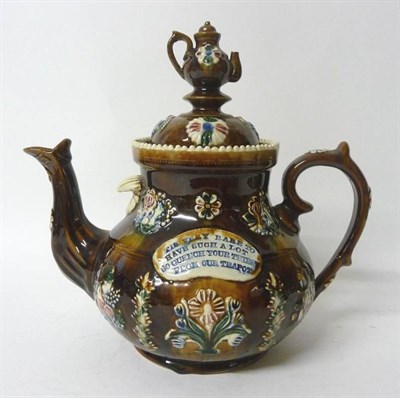 Lot 76 - A Measham Bargeware Large Teapot and Cover, dated 1889, of baluster form, the domed cover with...