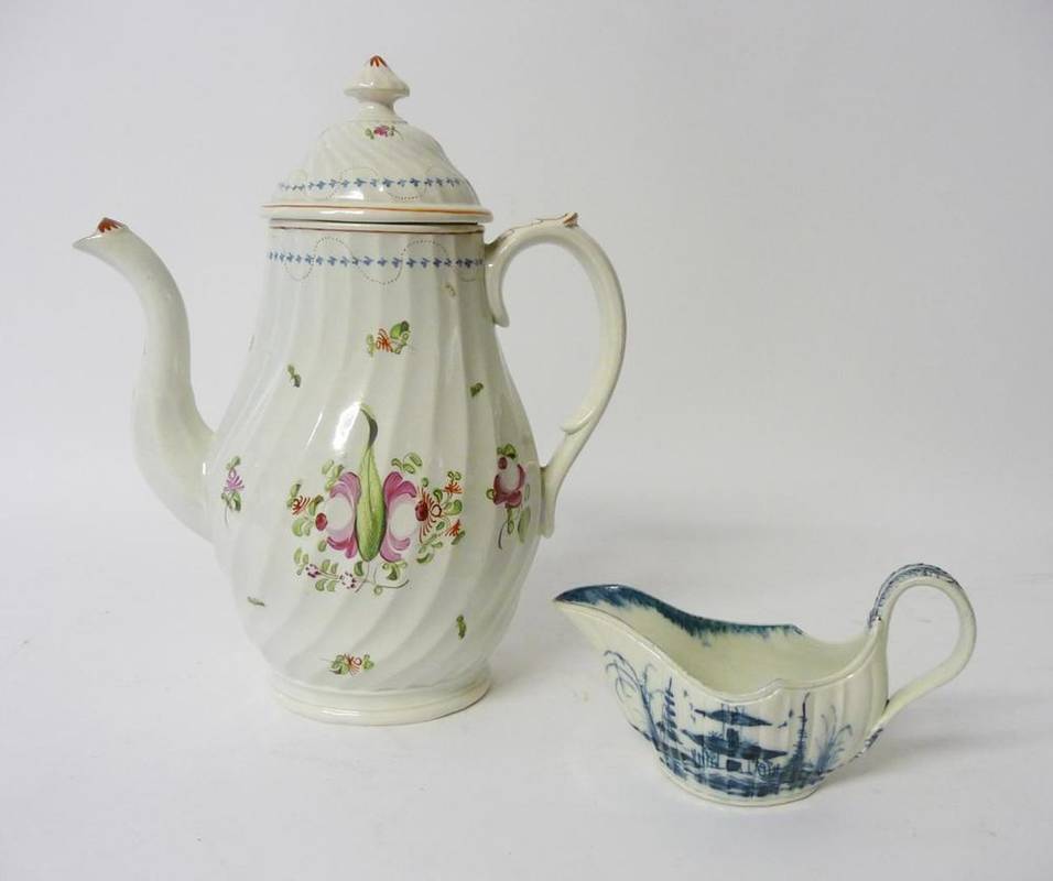 Lot 83 - A Pearlware Coffee Pot and Cover, circa 1790, of wrythen fluted ovoid form, painted in famille rose