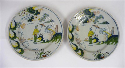 Lot 85 - A Pair of English Delft Plates, possibly Vauxhall, circa 1760, painted in blue, green, yellow...