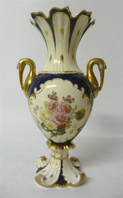Lot 99 - A Rockingham Porcelain Vase, 1831-1842, of baluster form with fluted flared neck and twin...