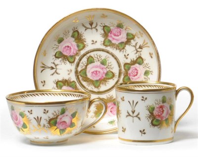Lot 103 - A Nantgarw Porcelain Trio, circa 1820, painted with scattered pink roses and gilt seaweed on a...