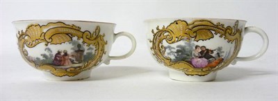 Lot 159 - A Pair of Meissen Porcelain Teacups, circa 1735, painted in colours with European lovers in...