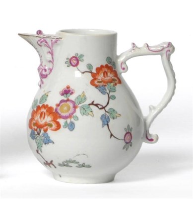 Lot 163 - A Meissen Porcelain Milk Jug, circa 1740, with scroll moulded spout and tau handle, painted in...