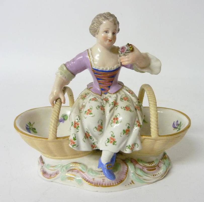 Lot 175 - A Meissen Porcelain Figural Salt, late 19th/early 20th century, as a girl in 18th century...