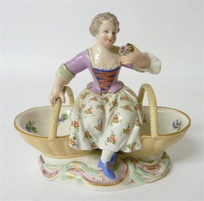 Lot 175 - A Meissen Porcelain Figural Salt, late 19th/early 20th century, as a girl in 18th century...