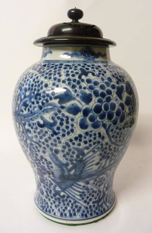 Lot 202 - A Chinese Porcelain Baluster Jar, 18th century, painted in underglaze blue with phoenix amongst...