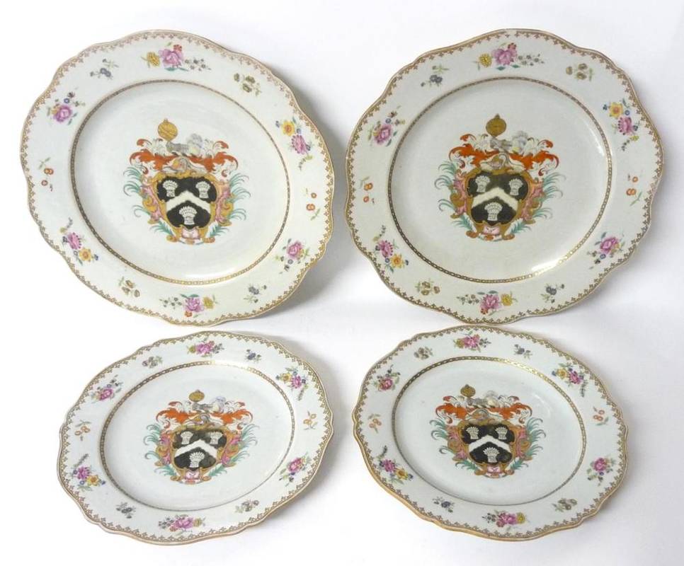 Lot 216 - A Pair of Chinese Porcelain Armorial Dishes, Qianlong, of lobed circular form, painted in...