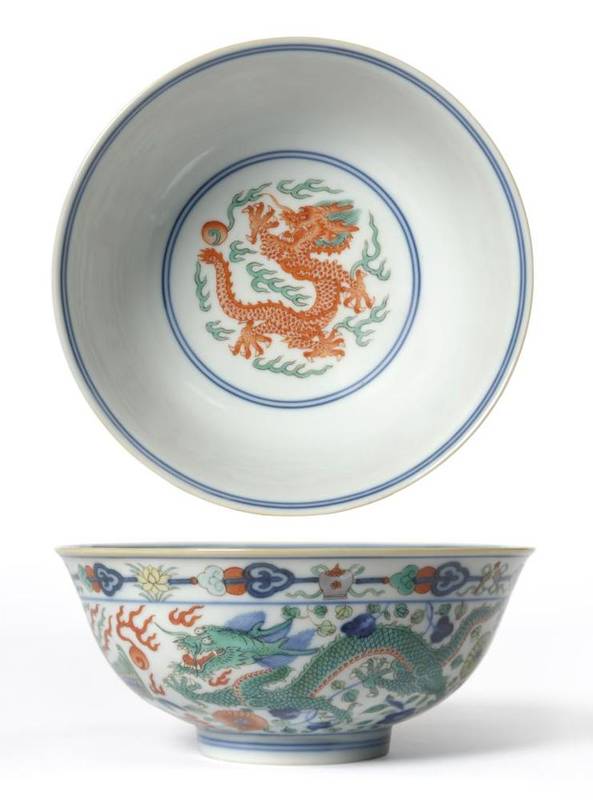 Lot 226 - A Chinese Wucai Porcelain Bowl, Daoguang mark, 1821-50 and of the period, finely painted with...