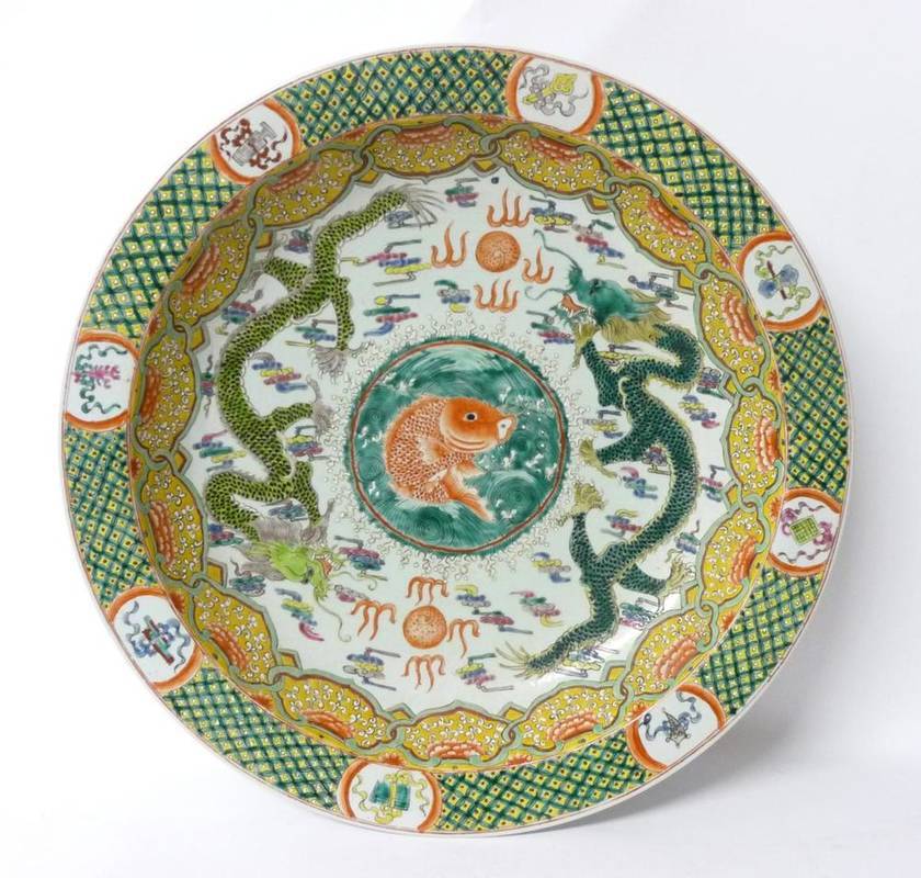 Lot 228 - A Chinese Porcelain Dish, Kangxi reign mark but later, painted in famille verte enamels with a...