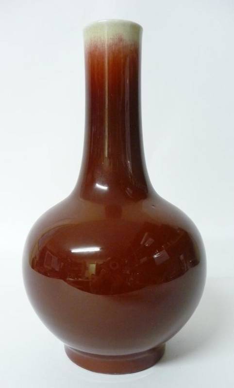 Lot 234 - A Chinese Sang de Boeuf Bottle Vase, 19th century, 28.5cm high