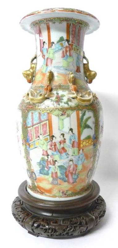 Lot 242 - A Cantonese Porcelain Baluster Vase, mid 19th century, the flared neck with frilled rim and applied