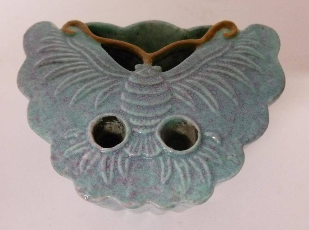 Lot 244 - A Chinese Duck Egg Blue Glazed Inkstand, 19th/20th century, modelled as a butterfly with two...