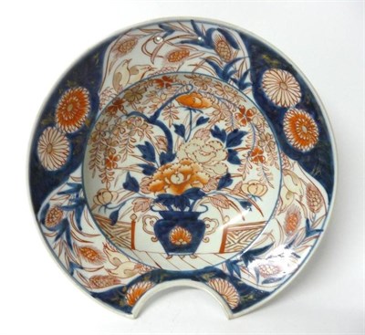 Lot 247 - An Imari Porcelain Barber's Bowl, 18th century, of traditional form, painted in typical colours...