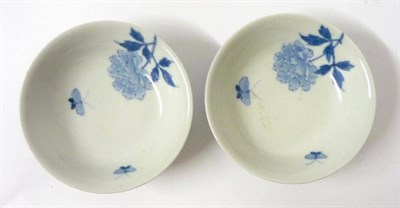 Lot 250 - A Pair of Nabeshima Shallow Dishes, in 17th century style, painted with flowering lotus and...