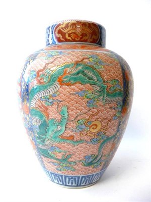 Lot 252 - An Imari Porcelain Jar, Cover and Inner Cover, Meiji period, typically painted with dragons chasing
