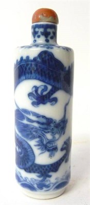 Lot 258 - A Chinese Blue and White Porcelain Snuff Bottle, 19th century, cylindrical, painted with a sky...