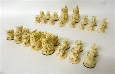 Lot 279 - An Indian Ivory Chess Set, mid 20th century, the kings and queens carved as elephants with...