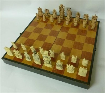 Lot 280 - A Cantonese Ivory Chess Set, mid 20th century, as standing figures in traditional costume, the king