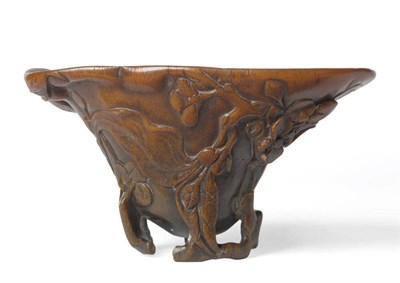 Lot 281 - A Chinese Rhinoceros Horn Libation Cup, 17th/18th century, as an open mallow blossom,...
