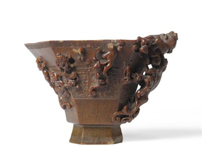Lot 283 - A Chinese Carved Rhinoceros Horn  "Twenty-Six Dragon " Libation Cup, 17th century, of archaic...