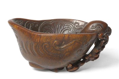 Lot 284 - A Chinese Carved Rhinoceros Horn Libation Cup, 17th/18th century, modelled as a duck complete...
