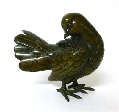 Lot 286 - A Japanese Bronze Figure of a Bird, Meiji period, standing, its head turned to preen its wing...