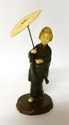 Lot 287 - A Japanese Bronze and Ivory Figure of a Girl, Meiji period, in traditional flowing robes, her...