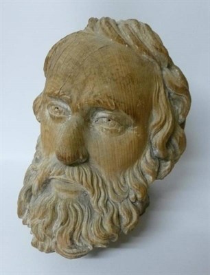 Lot 327 - A Carved Limewood Head of a Man, probably 18th century, with flowing hair and long beard,...