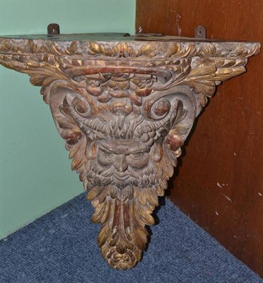 Lot 347 - A Polychrome Giltwood and Gesso Corner Wall Bracket, in early 18th century style, the trefoil...