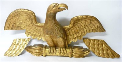 Lot 348 - A Giltwood and Gesso Cresting, 19th century, as an eagle, its wings outstretched perched on a...