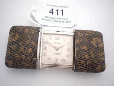 Lot 411 - A Purse Watch, signed Movado, chronometre Ermeto, 1928, lever movement, silvered dial with...