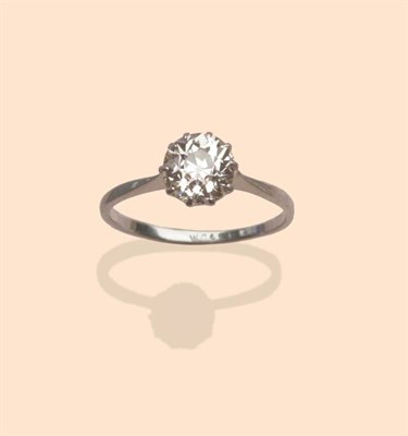 Lot 446 - A Diamond Solitaire Ring, an old cut diamond in a white claw setting to a tapered shoulder...