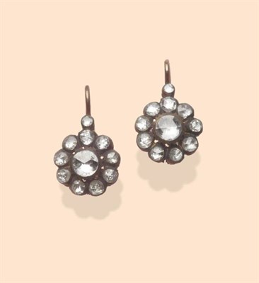 Lot 454 - A Pair of Diamond Cluster Earrings, a rose cut diamond within a border of smaller rose cuts,...