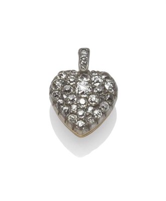 Lot 463 - A Late Victorian Diamond Set Heart Pendant, set throughout with old cut diamonds in white claw...