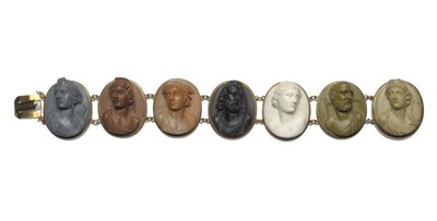 Lot 471 - A Lava Cameo Bracelet, seven bust portraits in high relief in shades of beige, brown, white and...