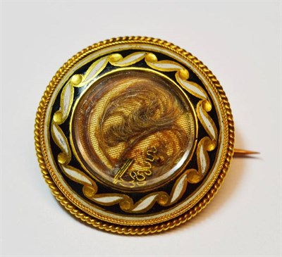 Lot 472 - A Mourning Brooch, of circular form, with a locket front enclosing a lock of hair, within a...