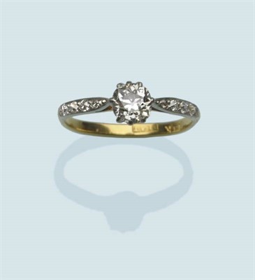 Lot 478 - A Diamond Solitaire Ring, an old cut diamond to tapered diamond-set shoulders, in white claw...