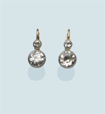 Lot 481 - A Pair of Diamond Two Stone Earrings, each with graduated old cut diamonds in white rubbed over...