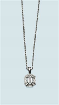 Lot 482 - A Diamond Cluster Pendant on An 18 Carat White Gold Chain, an emerald cut diamond spaced to a frame