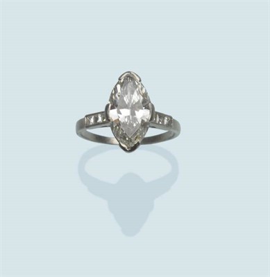 Lot 484 - A Diamond Solitaire Ring, a marquise cut diamond within a white four claw setting, to shoulders...