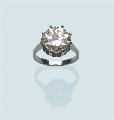 Lot 485 - A Diamond Solitaire Ring, the old brilliant cut diamond in a white eight claw raised setting,...