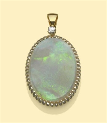 Lot 496 - An Opal and Diamond Pendant, the polished oval opal of mainly green and blue tones within a...