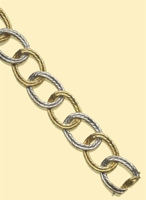 Lot 499 - An 18 Carat Gold Bracelet, by Asprey & Co. Ltd., 1970, of large plaited loop links, alternating...