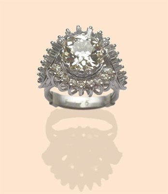 Lot 518 - A Diamond Cluster Ring, circa 1970, set with an old cut diamond centrally of 3.50 carat...