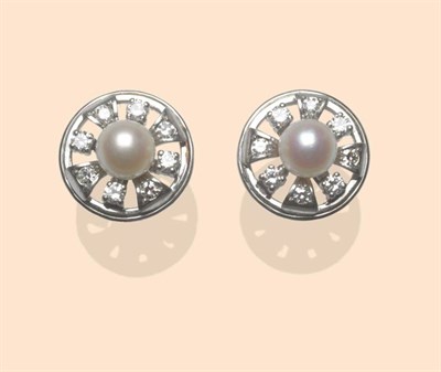 Lot 520 - A Pair of Cultured Pearl and Diamond Cluster Stud Earrings, each with a round cultured pearl within