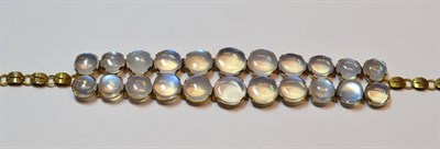 Lot 523 - A Moonstone Bracelet, a double row of graduated cabochon moonstones, to a fancy link bracelet,...